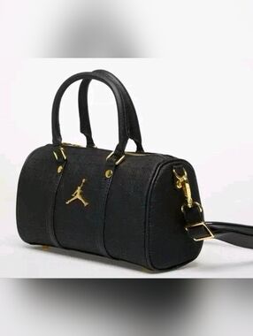 Jordan Black Barrel Shoulder Bag with Gold Hardware